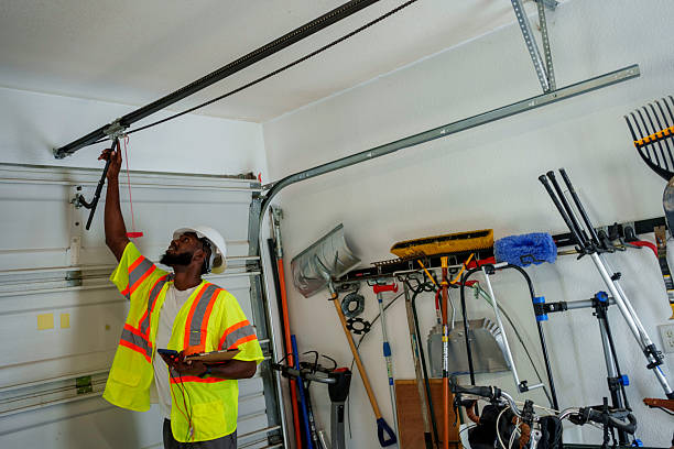 Professional Garage Door Panel Replacement technician working in Spencerville, NM